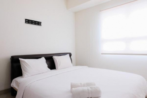 Simply Furnished 1BR at Paramount Skyline Apartment By Travelio